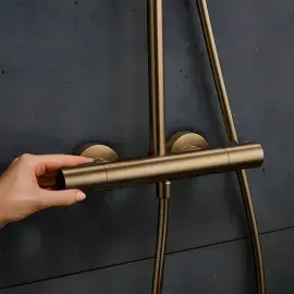 Душова система з термостатом Pulsify S Puro Hansgrohe 24237140 Brushed Bronze — деталь крупним планом